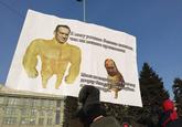 Text roughly says (according to OP):

_I can absorb more novichok than you can produce._

_Mmm don't swim near my Palace m'kay ?_