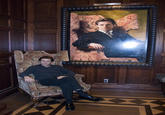 Willem Dafoe Sitting Next to His Own Portrait