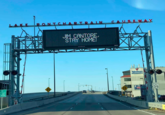 NO CYCLES LLOWED BRIDGE 11 PONTCHARTRAIN JIM CANTORE, STAY HOME! DARTRONIC CAUSEWAY Va Volunteers of America EQ 831-2 SPEED LIMIT 35