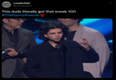 LunaticZoid @LunaticZoid This dude literally got that sneak 100 #TheGameAwards ... Geoff Keighley The Game Awards 2022 Outerwear Coat Flash photography Sleeve Gesture Font Blazer Gadget