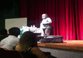 The context is that this is part of a <a href="https://blog.desdelinux.net/en/richard-stallman%27s-day-of-fury-in-brazil/">talk given by Richard Stallman</a> <a href="https://br-linux.org/wparchive/2012/o-dia-em-que-richard-stallman-teve-um-conflito-idiomatico-no-brasil.php">in Brazil</a>, back in 2012. At first, he asked if the audience prefered him to speak in English or Spanish, it was 50/50, so he went with English. After talking for 20 or 40 minutes (I can't find a reliable account on this), the organizer of the event tells him to speak in Spanish because the audience overstimated their own understanding of English. Stallman, as anyone who was in his place would be, was not pleased with this, because time is limited, and he would have to do the talk again in order for people to get his point.
<iframe width="560" height="315" src="https://www.youtube-nocookie.com/embed/dcUQ7QHP_p0?start=1035" title="YouTube video player" frameborder="0" allow="accelerometer; autoplay; clipboard-write; encrypted-media; gyroscope; picture-in-picture; web-share" allowfullscreen></iframe>