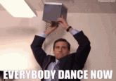 Michael Scott dancing with a boombox in the 'Everybody Dance Now' scene from The Office