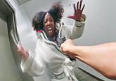 Template image of Sydney Wilson charging a police officer pointing a gun at her 