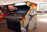 Kevin James Smirking edit placed on a Mortal Kombat 4 arcade machine