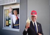 Photograph of the United States presidential candidate and former president Donald Trump waving from a drive-thru window during his October 2024 photo op at a McDonald's restaurant in Pennsylvania with Joe Biden wearing a Trump hat and holding an ice cream edited in.