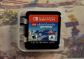 Feels weird (and ironic) to see a PlayStation logo on a Nintendo cartridge. LEGO NINTENDO • SWITCH HORIZON ADVENTURES EVERYONE 10 4 STUDIOS LA-H-BCHKA-USA