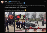 Judy F @judytgolf · 21h The FEDS are up to no good again. A group of neo-Nazis carrying flags bearing swastikas were seen marching through the streets of Ohio on Saturday. Noticed they all covered their faces!