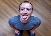An AI-generated image of Mark Zuckerberg standing on his knees and sticking his tongue out in a suggestive pose.