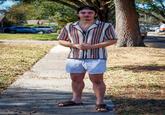 Lachborne "Lucky" Bachkhaz recreates his iconic "You Know I Had to Do It to Em" photo on the same spot on Capitol Drive in Tampa 10 years later (Credit to Tampa Bay Times).