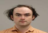 The mugshot of William Banks, a "Twitter / X":https://knowyourmeme.com/memes/sites/twitter-x user who was arrested, convicted and imprisoned for stealing and throwing out pro-Israel, Zionist signs in Connecticut. Banks went viral for his arrest and a series of videos and photos taken within the prison.