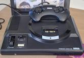 The Sega system VOLUME SEGA y ddy 16-BIT ON OFF -POWER POWER RESET ON TRIGGER MEGA DRIVE SEGA