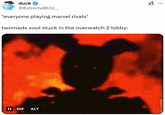 A GIF caption meme about YouTuber Twomad's soul still being stuck in an Overwatch lobby.
