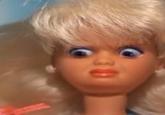 A reaction image of a Barbie doll with a disgusted expression. The image is slightly cropped.