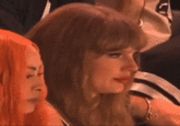 GIF of Taylor Swift getting booed at the 2025 Super Bowl LIX, where her then-boyfriend "Travis Kelce's":https://knowyourmeme.com/memes/events/taylor-swift-and-travis-kelces-relationship team the Kansas City Chiefs lost to the Philadelphia Eagles. The video shows Taylor Swift being projected onto the stadium's Jumbotron, causing Eagles fans or disgruntled Chiefs fans to boo the pop star. Taylor Swift looks sideways at the Jumbotron camera before laughing and appearing to say "What's going on."