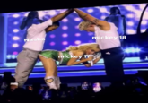 Meme based on Sabrina Carpenter's Paris night two "Juno Pose," where she simulated the "Eiffel Tower" sex position by bending over between two backup dancers.