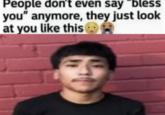 A "meme":https://knowyourmeme.com/memes/memes using the photo of Latino "Edgar":https://knowyourmeme.com/memes/edgar-edgar-haircut "influencer":https://knowyourmeme.com/memes/social-media-influencer and "TikToker":https://knowyourmeme.com/memes/sites/tiktok Lil G standing in front of a red brick wall.