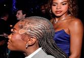 A tweet by @mypussyisYUM containing a cropped version of a photo originally showing Jay Z congratulating Doechii at the Grammys. This image shows Blue Ivy looking at Doechii's head, and highlights the singer's facetape. 