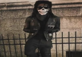 A photo allegedly showing underground "rap":https://knowyourmeme.com/memes/cultures/rap-hip-hop producer TDF wearing a skull facemask.