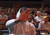 GIF of Ja Morant failing to block the TNT cameras at an NBA game.