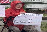 A photo of a 102-year-old veteran at a June 2025 "No Kings" protest, holding a sign reading, "I fought "fascism":https://knowyourmeme.com/memes/fascism in 1945! At 102 I'm doing it again."