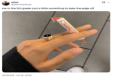 A photo of a hand holding a packet of Smarties like a c--------, captioned, "Me in the 5th grade: just a little something to take the edge off."