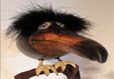 A photo of a gourd sculpture of a crow. The animal is known as "Skebob" in memes.