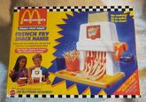 McDonald's Happy Meal Magic FRENCH FRY SNACK MAKER Make delicious snacks you can eat that look like McDonald's French Fries! Use foods found at home! See checklist on back! French Fry MAKER No cooking! EZ to make! EZ to clean! 10567 For ages 4 years and over. MATTEL NO BATTERIES REQUIRED! M VALUABLE COUPON & RECIPES INSIDE! INGREDIENTS NOT INCLUDED. Details on back