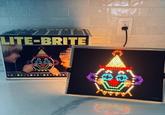 LITE-BRITE CAUT As with all elect should be obse Ages: & to Adult Put in picture outline sent color glow pegs Watch hem light CLOWN