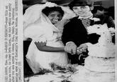 (JX2) JACKSON, Miss. Aug. 2--MARRIED IN MISSISSIPPI--Roger Mills and his new bride, the former Berta Linson, cut their wedding cake shortly after they were married in Jackson, Miss., Sunday. The interracial marriage ended one of Mississippi's final racial barriers. (AP WIREPHOTO) (jrt11630stf) 1970