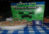 FAMILY SIZE Kellogg's 1409 CALORIES 130m SAT FAT SODIUM 0% DV 6% DV 12 TOTAL SUGARS PER 1 1/3 CUP SERVING MINECRAFT CREEPER CRUNC CINNAMON FLAVORED CEREAL WITH MARSHMALLOWS FLAVORED WITH OTHER NATURAL FLAVORS CREEPER BIT MARSHMALLOWS Yo hobe harmed during crafting of cerea ENLARGED TO SHOW TEXTURE THIS BOX UNLOCKS A CIAL IN-GAME CLOTHING EM FOR YOUR CHARACTER TRY IT IN MINECRAF CHARACTER CREATOR See back for details Code inside