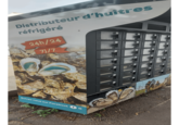 Distributeur d'huîtres réfrigéré 24h/24 7j/7 Suivez-nous sur Facebook f magnus orily