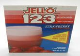 JELLO 123 BRAND GELATIN WITH TWO TOPPINGS STRAWBERRY ARTIFICIAL FLAVOR ONE MIX SEPARATES INTO THREE LAYERS MAKES FOUR % CUP SERVINGS NET WT 4.3 OZ.