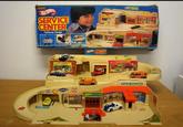 Hot Wheels SERVICE CENTER Foldaway Garage Ted's OYNAMOMETER CHAND GOOD YEAR PARKING AL'S SERVICE & TIRES MY SERVICE CENTER SERVICE CENTER RAND TRAME Lary's Towns 35 RAMP MATRANSMISSIONS CAR WASH