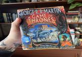 A GEORGE RR MARTIN A GAME OF THRONES "Grabs hold and won't let go. It's brilliant' ROBERT JORDAN 登 BOOK ONE OF A SONG OF ICE AND FIRE