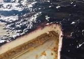 A photograph of a blueberry cheesecake. The photo also resembles a boat on the ocean.