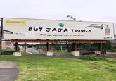 The trend where brands jokingly present a crude or low effort advertisement with the tagline, "our designer is on vacation" can be traced as far back as 2019, as seen in a May 31st, 2019 Facebook post showing a billboard promoting JAJA tequila. 