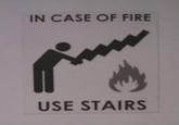 IN CASE OF FIRE USE STAIRS