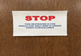 STOP THIS RESTROOM IS FOR SINGLE-USE ONLY AND IS UNDER VIDEO SURVEILLANCE