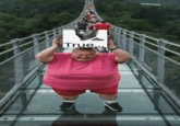 A "GIF":https://knowyourmeme.com/memes/cultures/gif of the "AI Video":https://knowyourmeme.com/memes/cultures/ai-video of a woman breaking a glass bridge by jumping backward with a big rock, paired with "Truth Nuke":https://knowyourmeme.com/memes/truth-nuke and "Morgan Freeman True":https://knowyourmeme.com/memes/morgan-freeman-true images.
