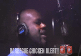 A GIF of the BBQ Chicken Alert meme, depicting "Shaquille O'Neal":https://knowyourmeme.com/memes/people/shaquille-oneal, or Shaq, saying the phrase in a recording booth.