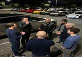 While the origin of the specific meme image of various tech CEOs standing around a parking lot is unclear, one of the earliest known posts featuring the image appeared on the Threads page @artificialintelligenceee on November 21st, gathering over 1,000 likes in three days.