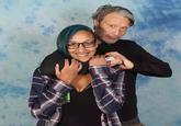 A photo of a fan requesting that Mads Mikkelsen choke them during a photo op.