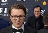 An AI generated image of Quentin Tarantino glaring at Paul Dano. The edit is by Cinexcepcion.