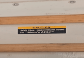CAUTION 300 lbs. maximum load in "Mom's Attic"