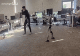 Man wearing humanoid mocap suit kicks himself in the balls