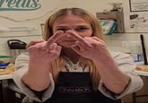 A reaction image of the racist Cinnabon girl giving middle fingers.