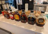STO GROW FREDERIK'S WHOLE STRUP AMBER COLOR Wisconsin Pure Maple Syrup FREDERIK'S MAPLE SYRUP 100% PURE FREDERIK'S MAPLE SYRUP 100% PURE DIRTY osi noilisfull AMERICA PRIVATE SELECTION PURE MAPLE SYRUP D GRADE A AMBER COLOR RICH TASTE 12 FL OZ (355ml)