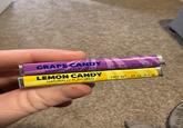 GRAPE CANDY ARTIFICIALLY FLAVORED LEMON CANDY NATURALLY FLAVORED NET WT: .29 oz. (8.5 g) NET WT: .29 oz. (8.5 g)