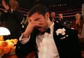 A reaction image of Bad Bunny crying. It is a meme from the Grammys 2026.