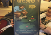 POTTY PUTTER TOILET GOLF GAME HAPPY HOUR The Criginal FUN WORKSHOP JUST PLAY USE IT AT THE OFFICE OR KEEP IT AT HOME! FINALLY YOU CAN PLAY SOME GOLF WITHOUT ALL THOSE BOTHERSOME PEOPLE The bathroom in pechags your last place of theedom, so don't let anyone inade i 0
